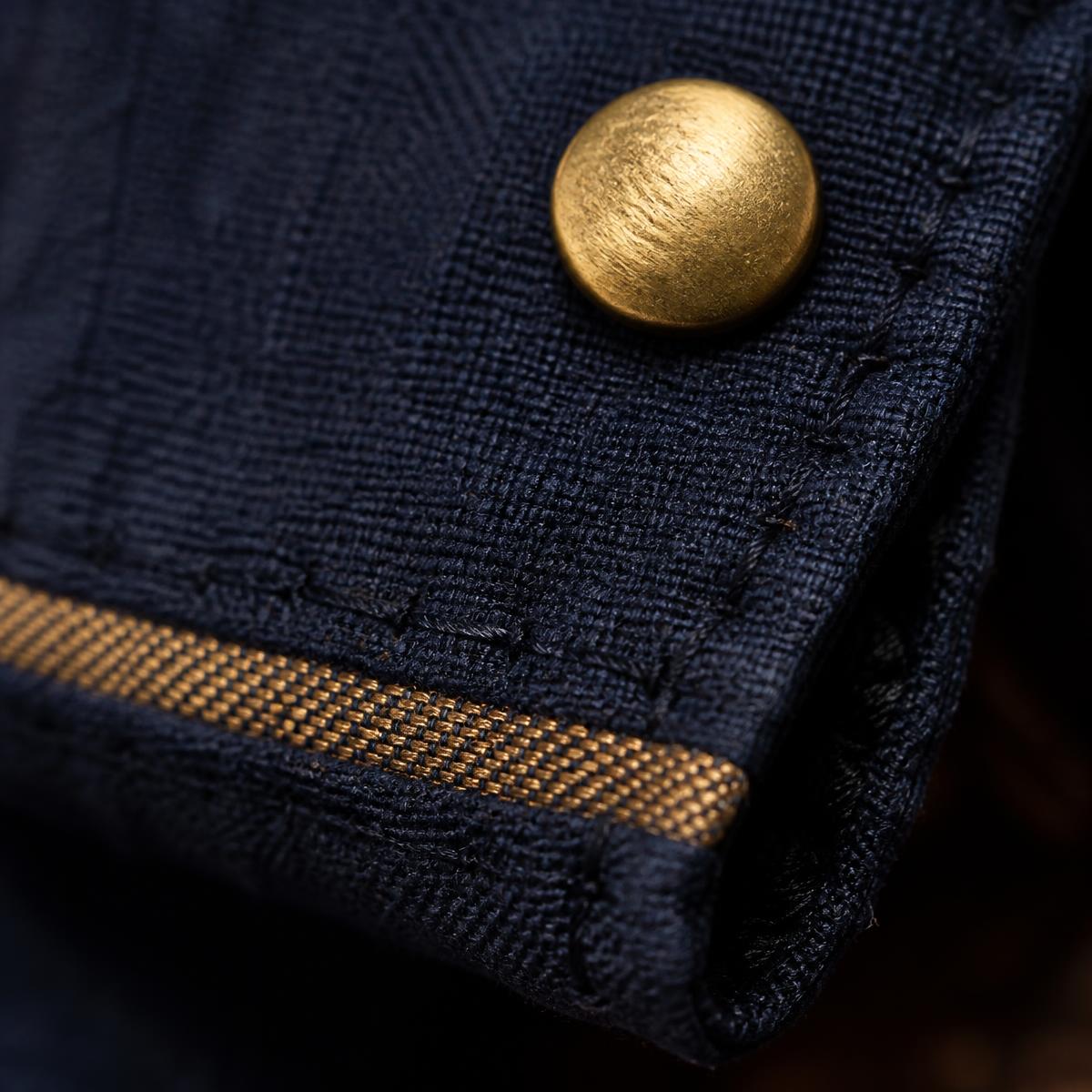 Detail of stitching on woven cloth